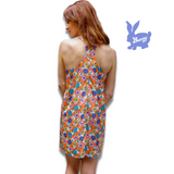 Orange 1960's style mini dress with multi-color floral print. Print by Dave Hill.